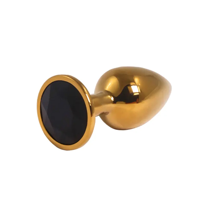 Mali zlatni analni dildo sa crnim dijamantom